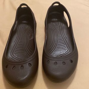 Crocs Brown Flat Shoes Size women 7 NWOT